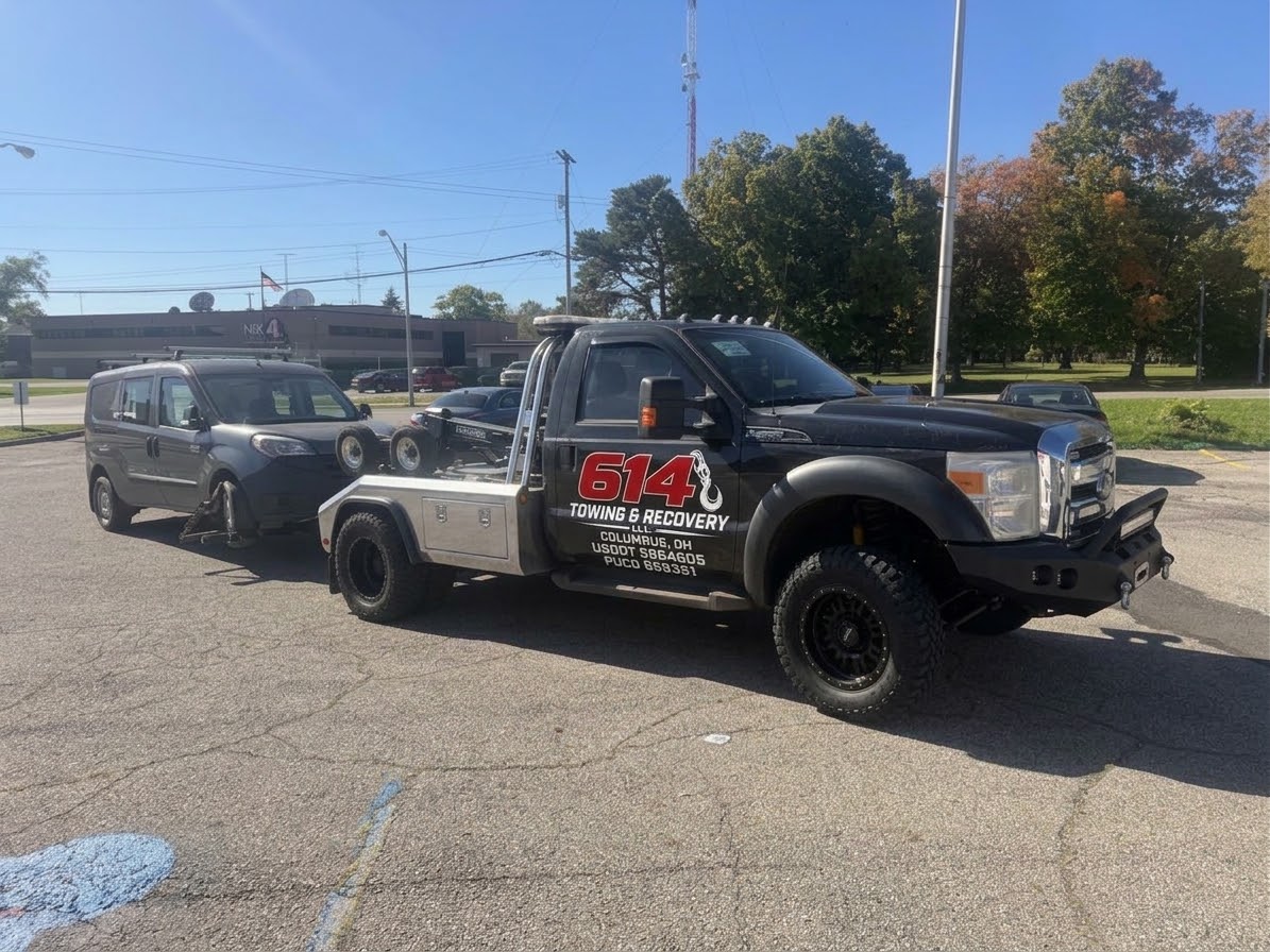 614 Towing & Recovery tow truck towing a van in Columbus, Ohio